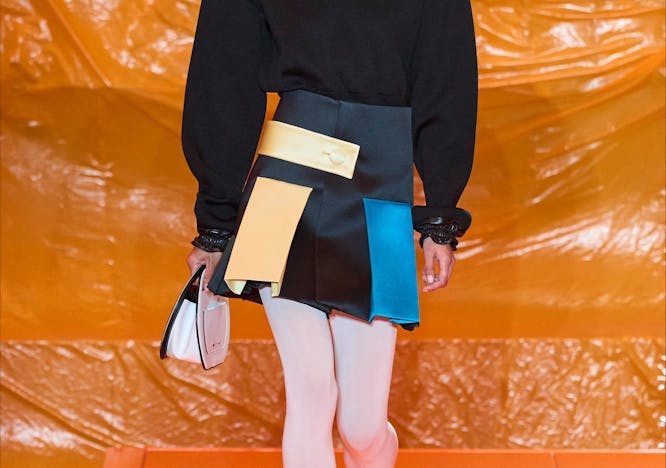 fashion adult male man person bag handbag footwear shoe skirt