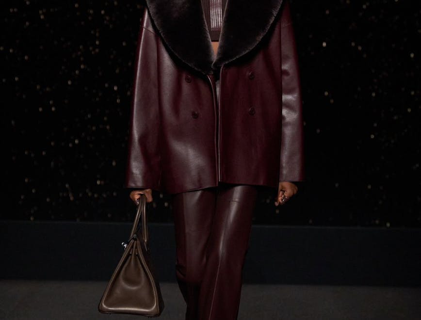 clothing coat fashion person standing adult male man bag handbag